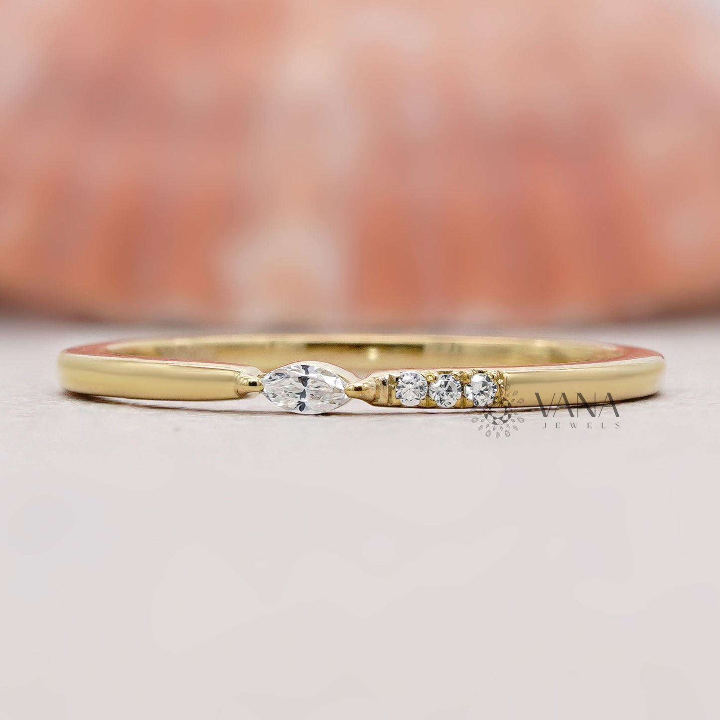 Marquise and round diamond wedding band
