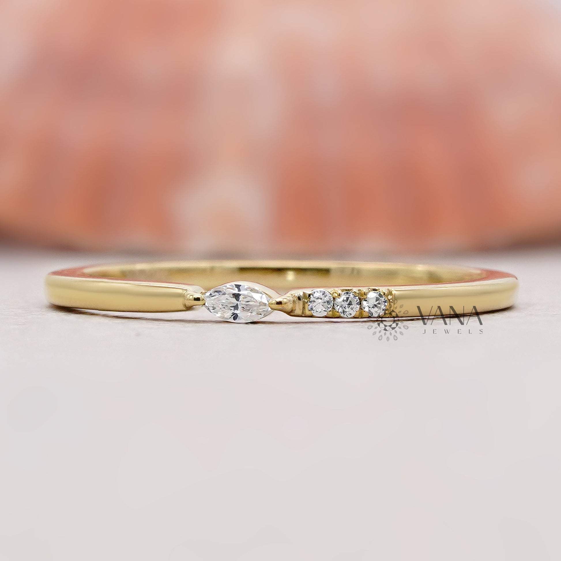 Marquise and round diamond wedding band
