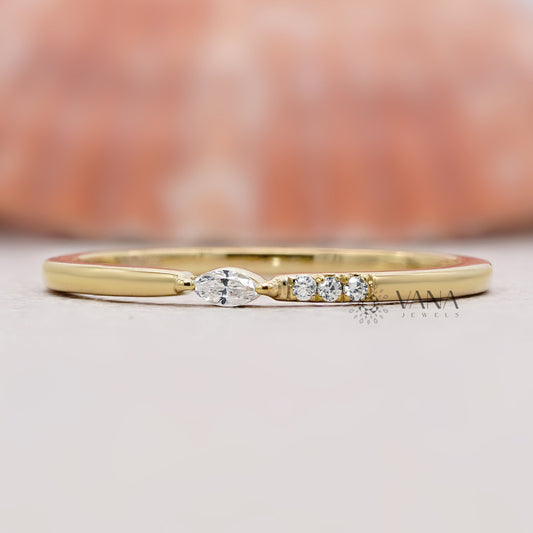 Marquise and round diamond wedding band
