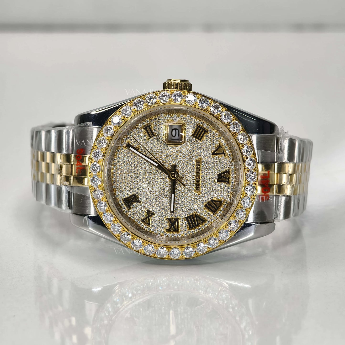 Luxury Two Tone Moissanite Watch with Roman Numeral Dial and Diamond Bezel.