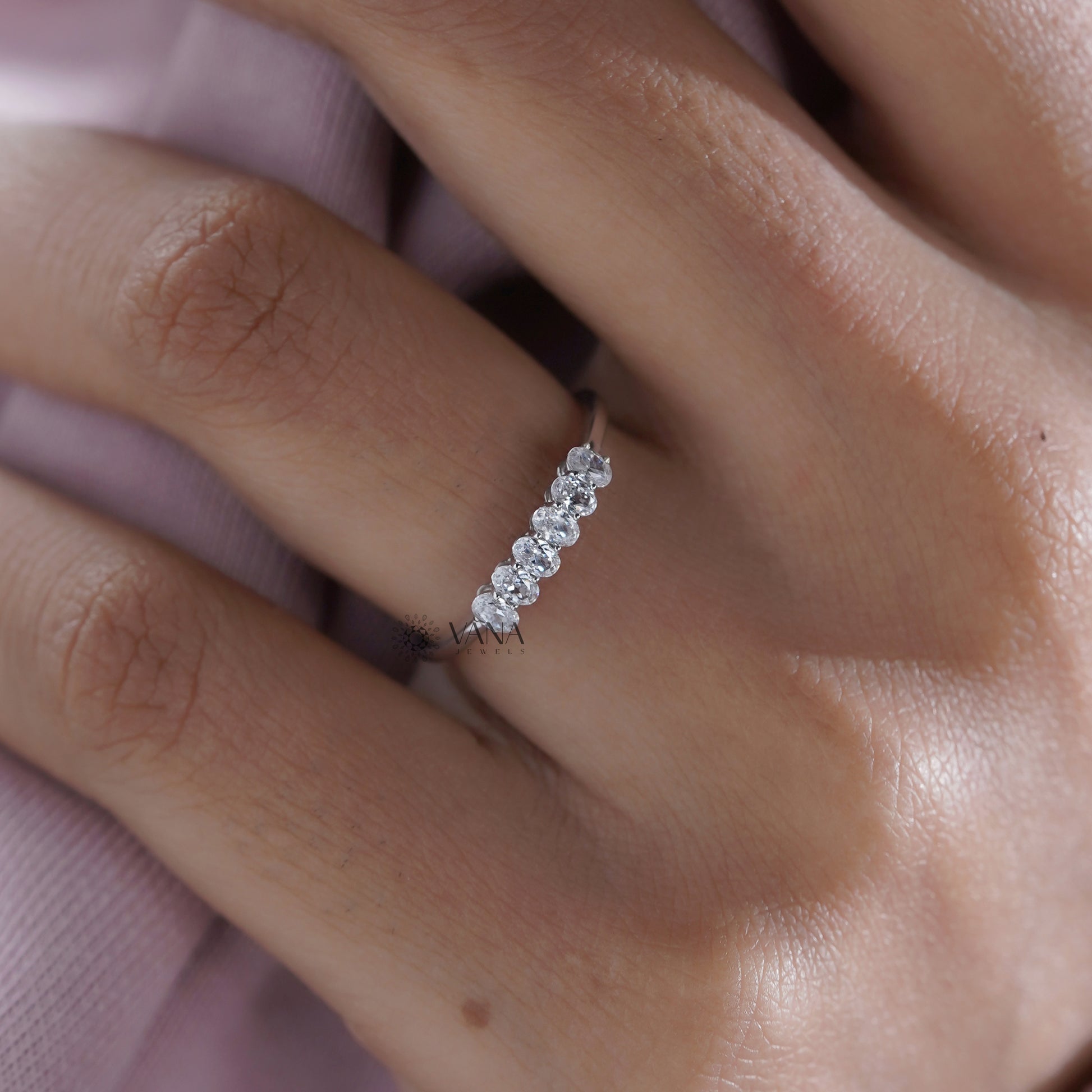 Six stone oval diamond band
