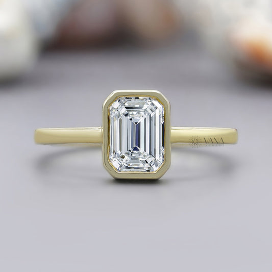 Emerald cut moissanite solitaire ring