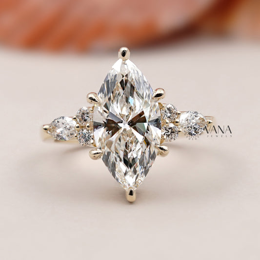 Vintage-inspired marquise shape engagement ring with round brilliant side diamonds