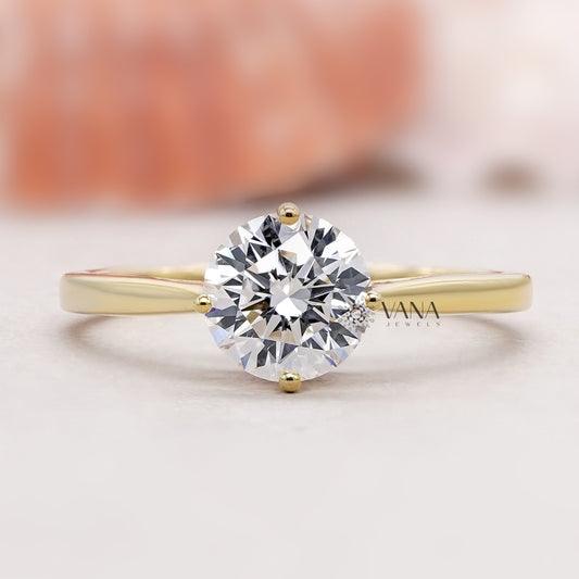 Cathedral set solitaire engagement ring