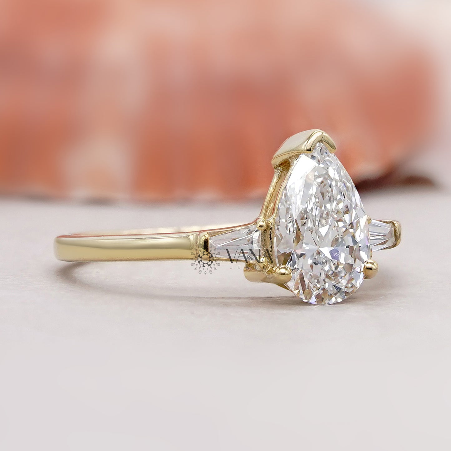 10K Yellow gold pear diamond ring

