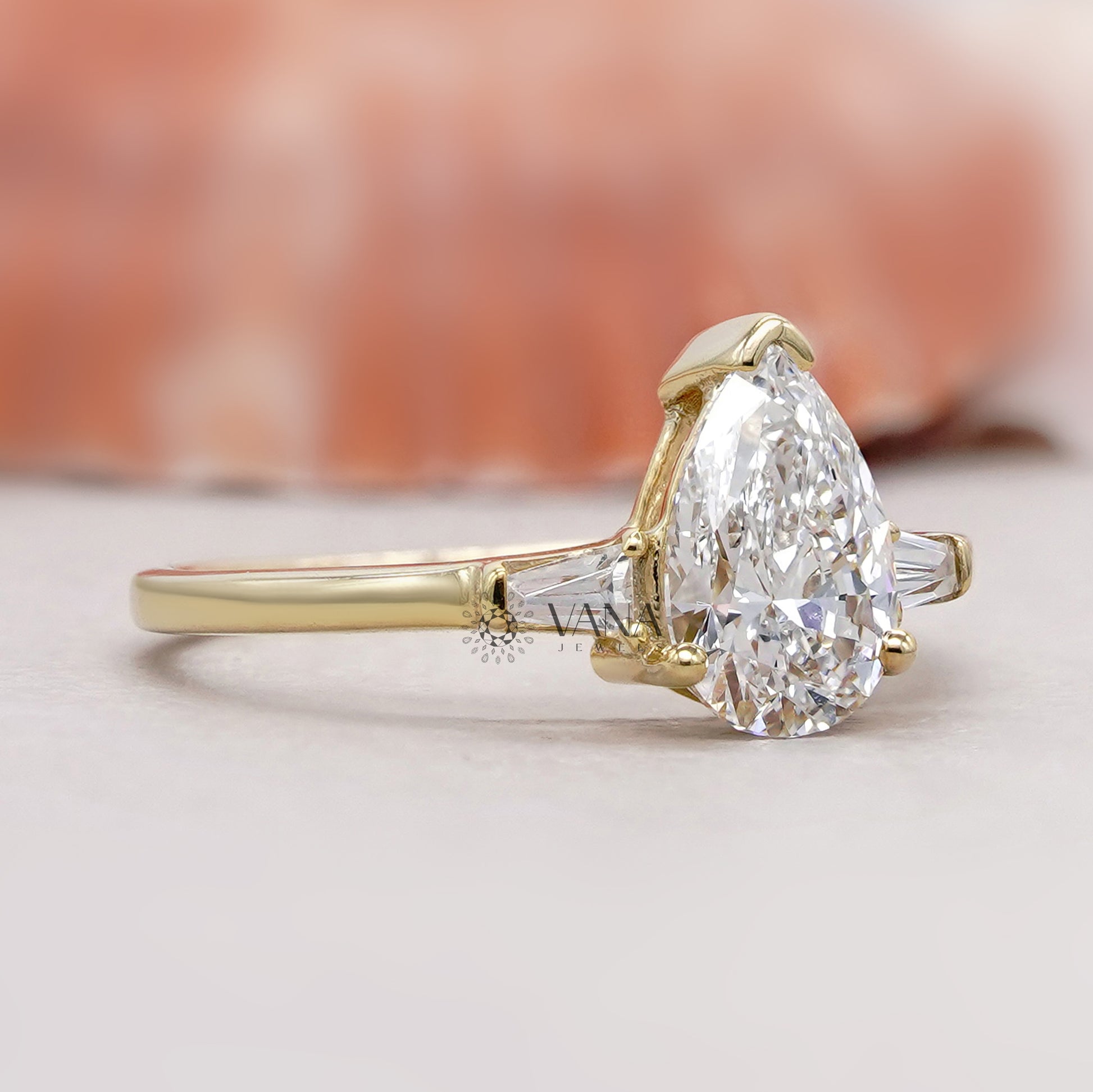 10K Yellow gold pear diamond ring
