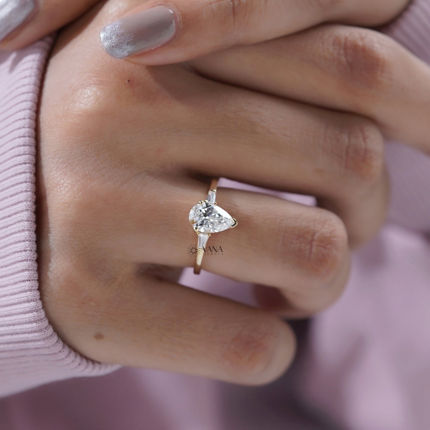 Pear Cut Moissanite Three Stone Engagement Ring with Tapered Baguette Side Stones