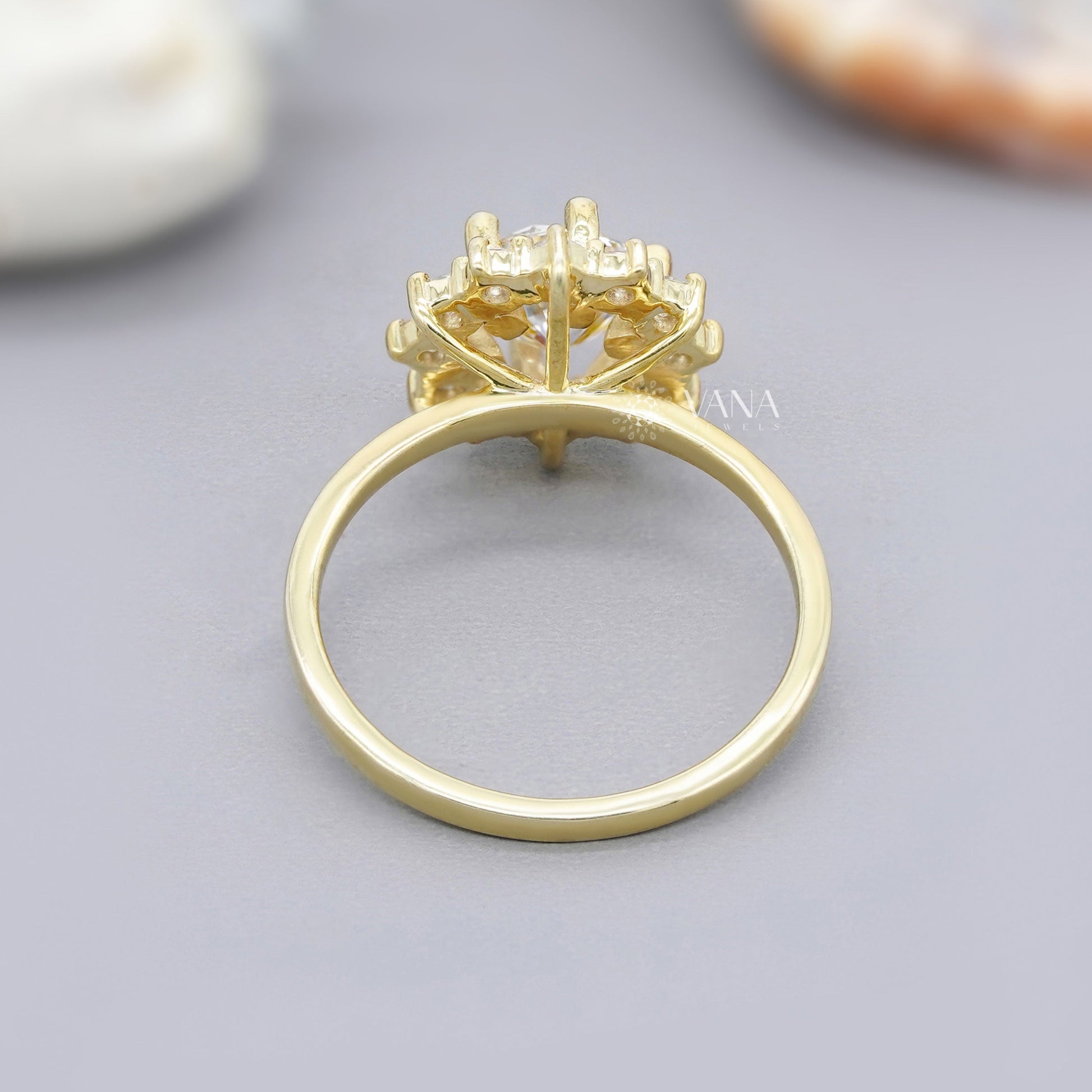 Handmade yellow gold engagement ring with flower-style