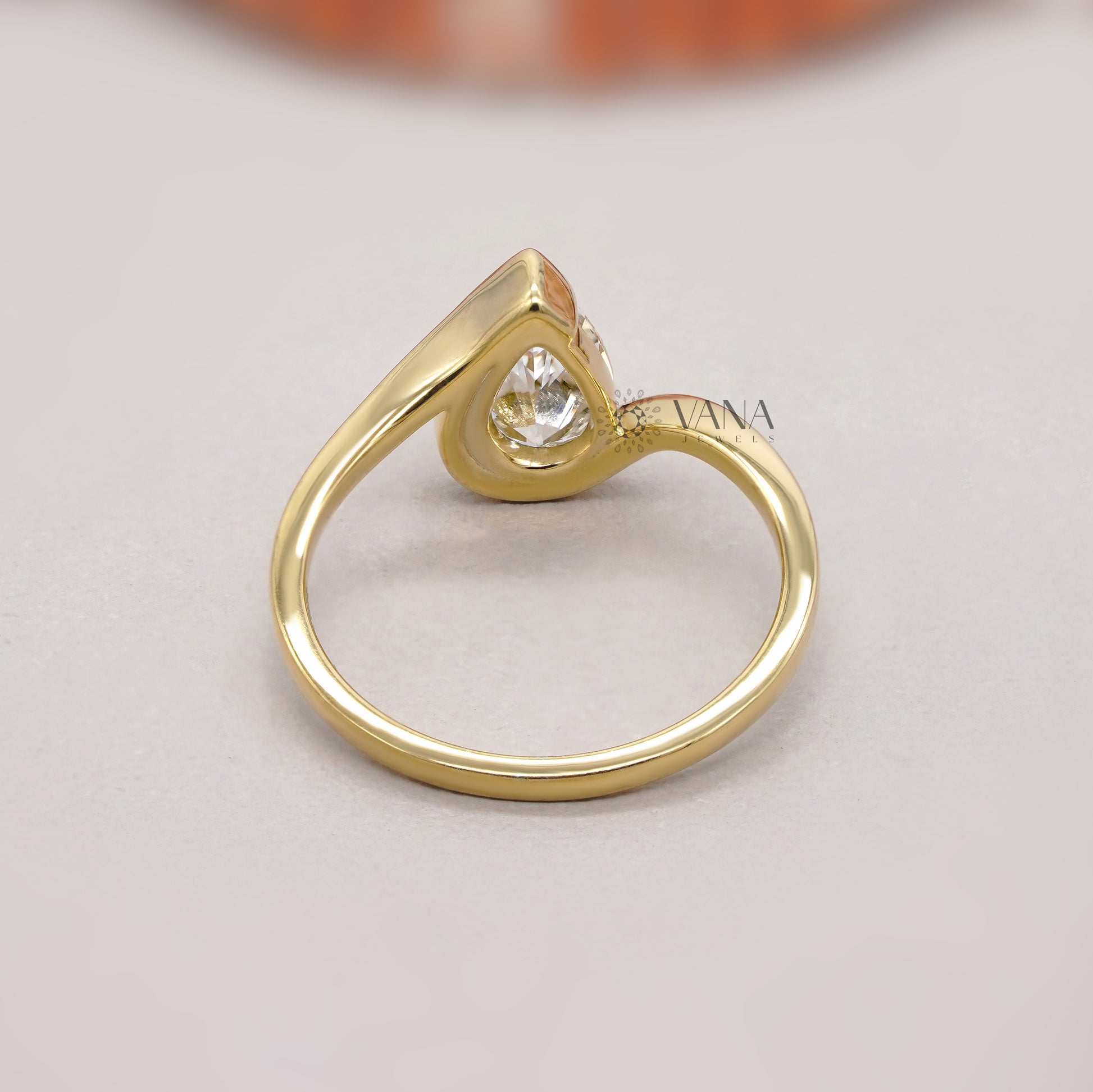 Teardrop Style Half Bezel Set Engagement Ring
