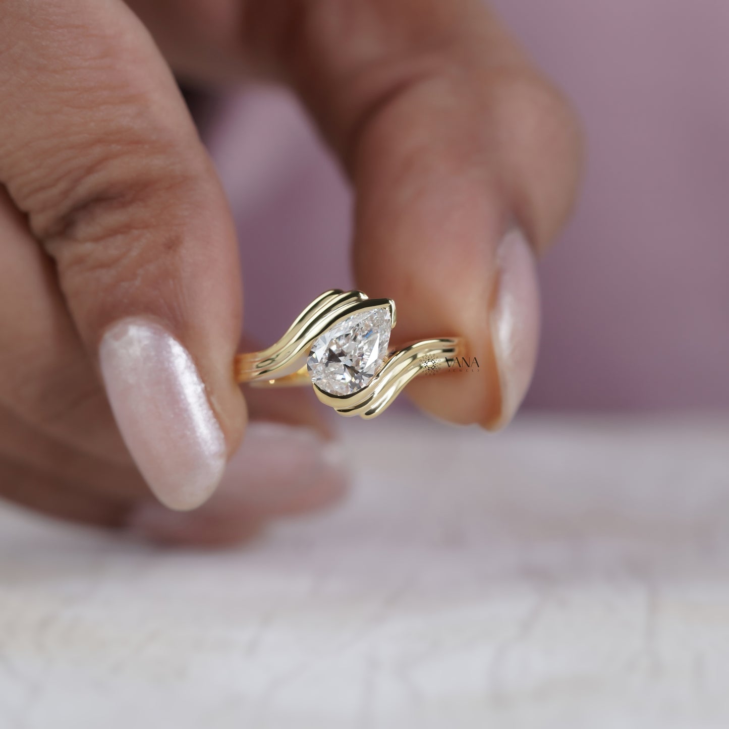 Pear Cut Lab Grown Diamond Solitaire Engagement Ring with Unique Bypass Shank