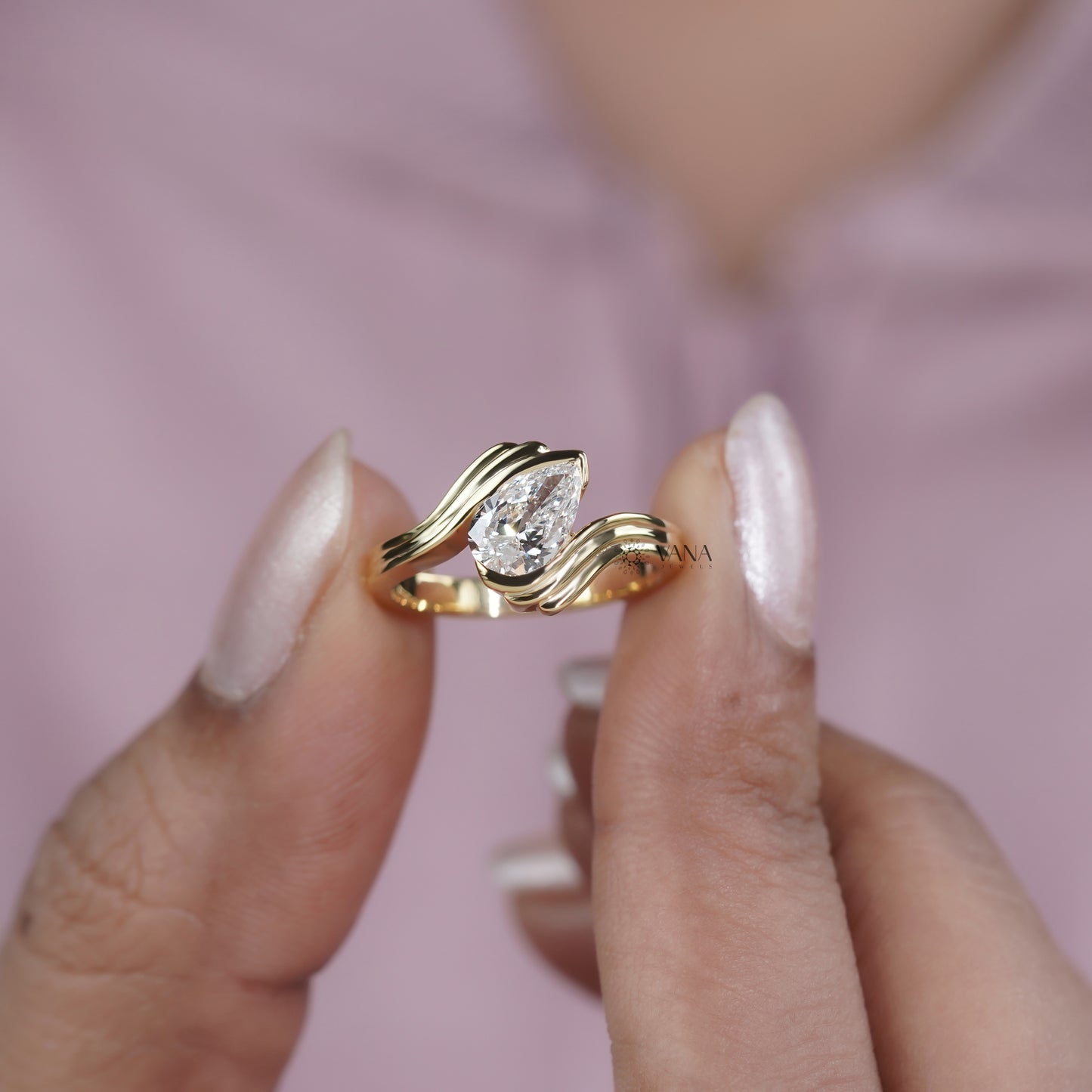 Pear Cut Lab Grown Diamond Solitaire Engagement Ring with Unique Bypass Shank