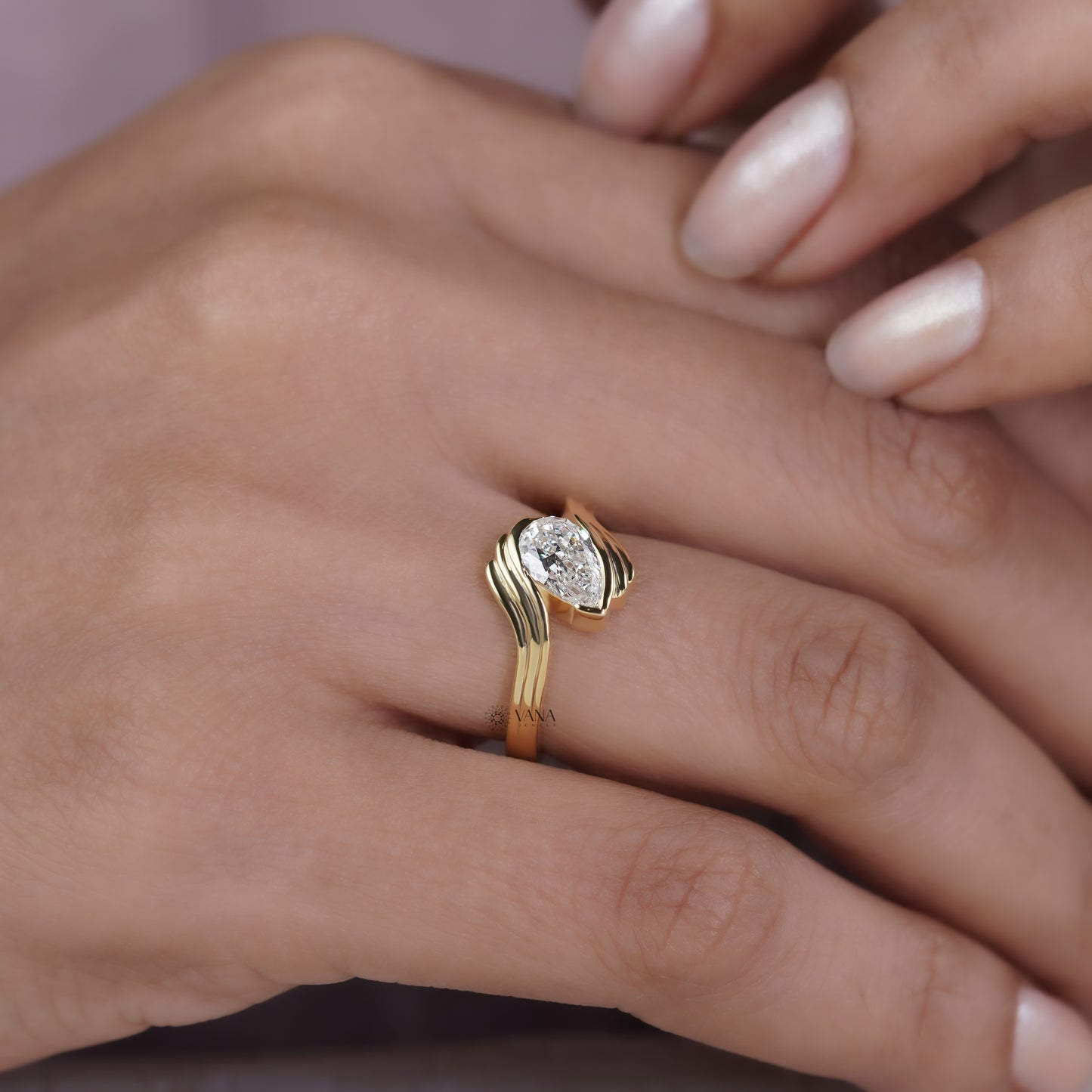 Pear Cut Lab Grown Diamond Solitaire Engagement Ring with Unique Bypass Shank