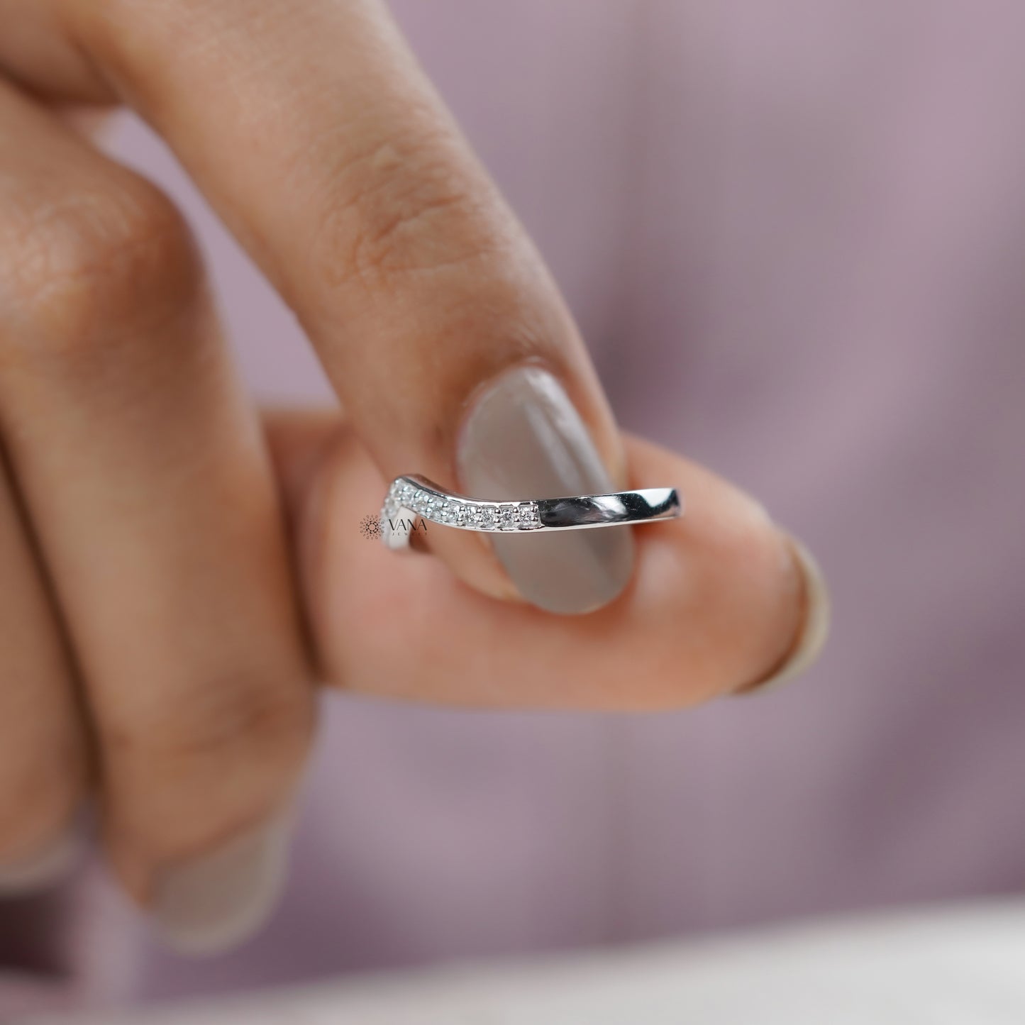 Modern curved chevron wedding band for ring stacking and bridal sets