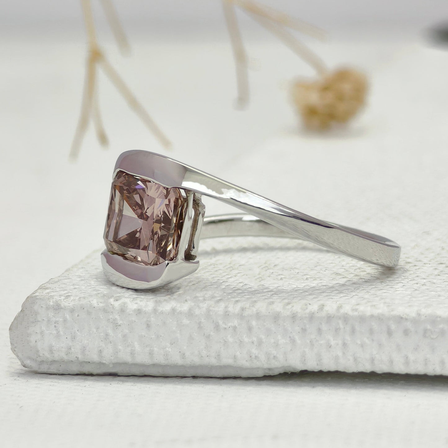Brown radiant diamond solitaire engagement ring
