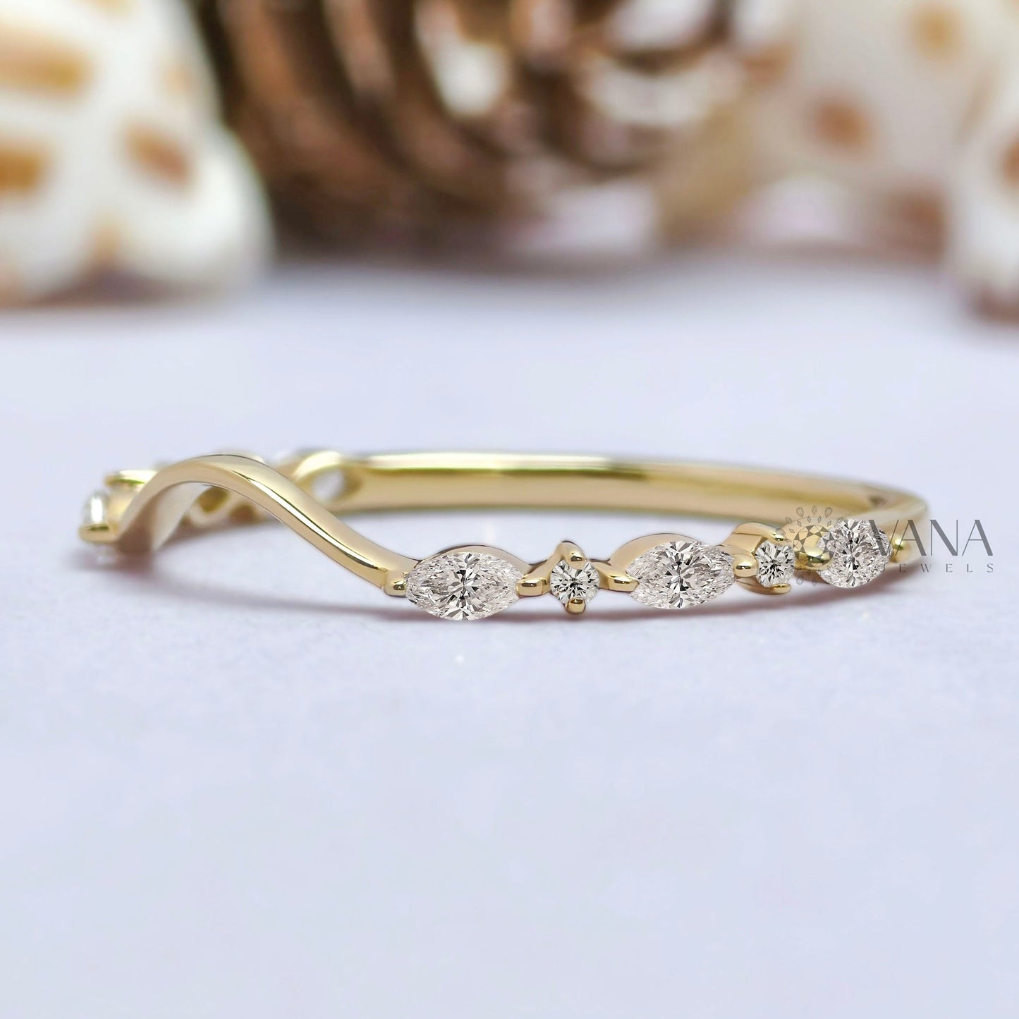 Curved Marquise and Round Moissanite Chevron Wedding Band in Solid Gold