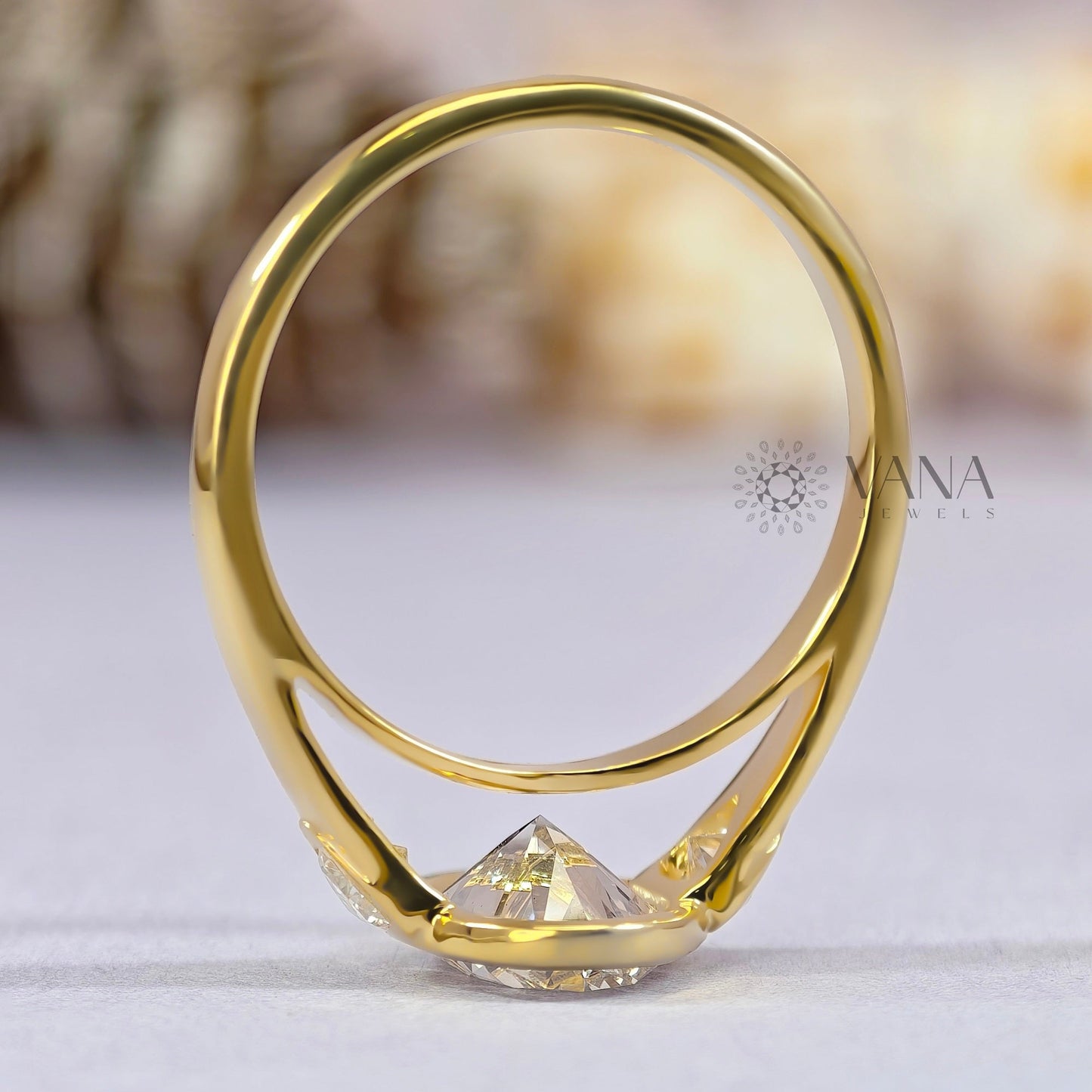 Oval Cut Moissanite Three Stone Bezel Set Engagement Ring in Yellow Gold