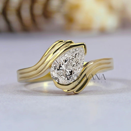 Pear Cut Moissanite Solitaire Engagement Ring with Half Bezel Set Bypass Shank
