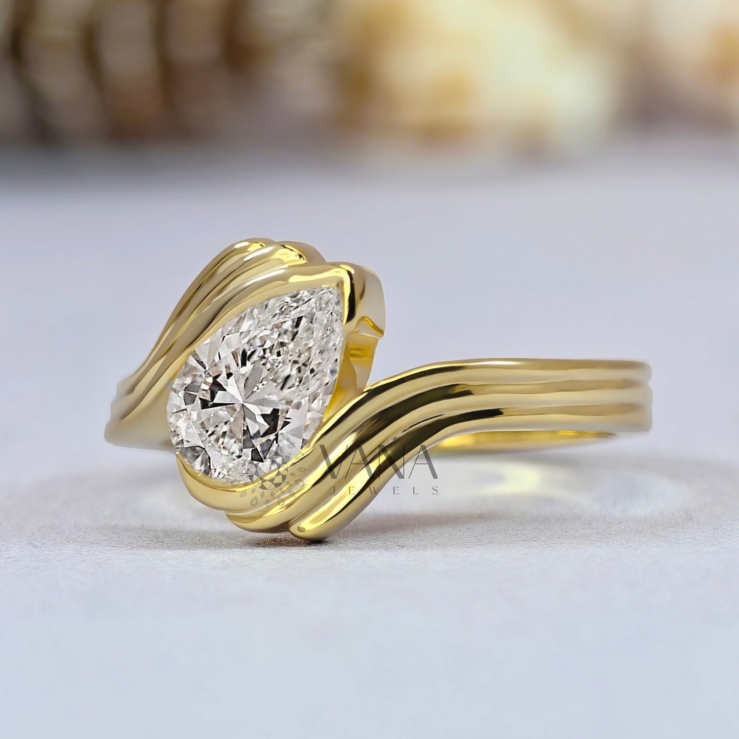 Pear Cut Moissanite Solitaire Engagement Ring with Half Bezel Set Bypass Shank