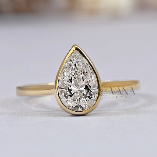 Bezel Set Pear Cut Moissanite Solitaire Engagement Ring with Cathedral Setting