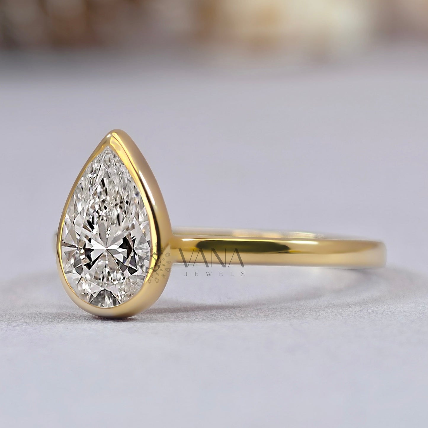 Bezel Set Pear Cut Moissanite Solitaire Engagement Ring with Cathedral Setting