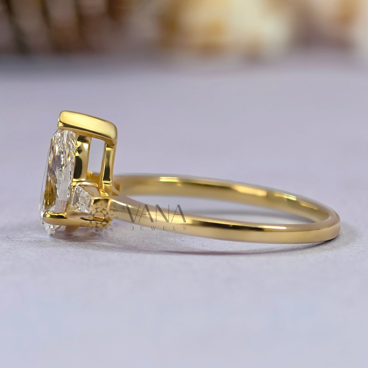 Pear Cut Moissanite Three Stone Engagement Ring with Tapered Baguette Side Stones