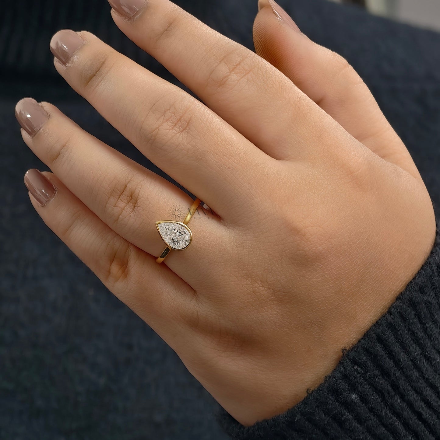 Bezel Set Pear Cut Moissanite Solitaire Engagement Ring with Cathedral Setting