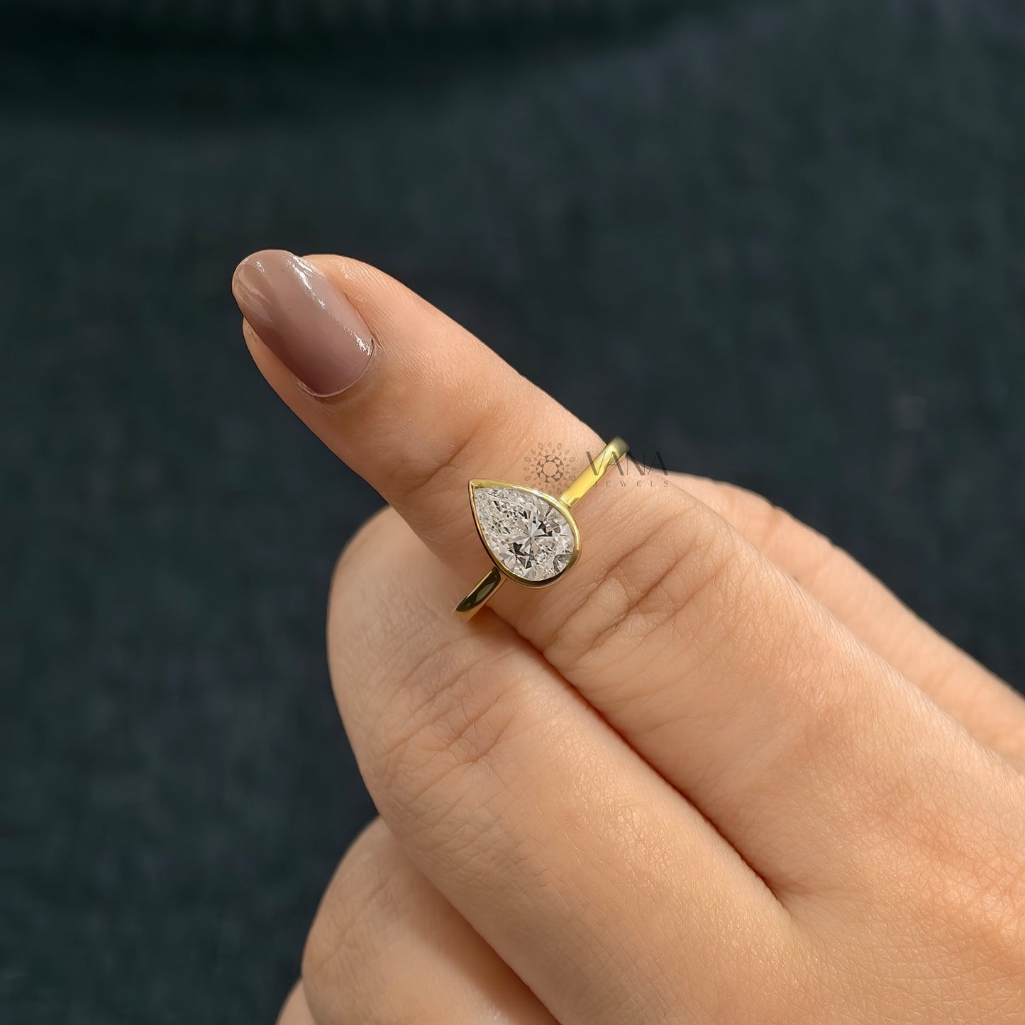 Bezel Set Pear Cut Moissanite Solitaire Engagement Ring with Cathedral Setting