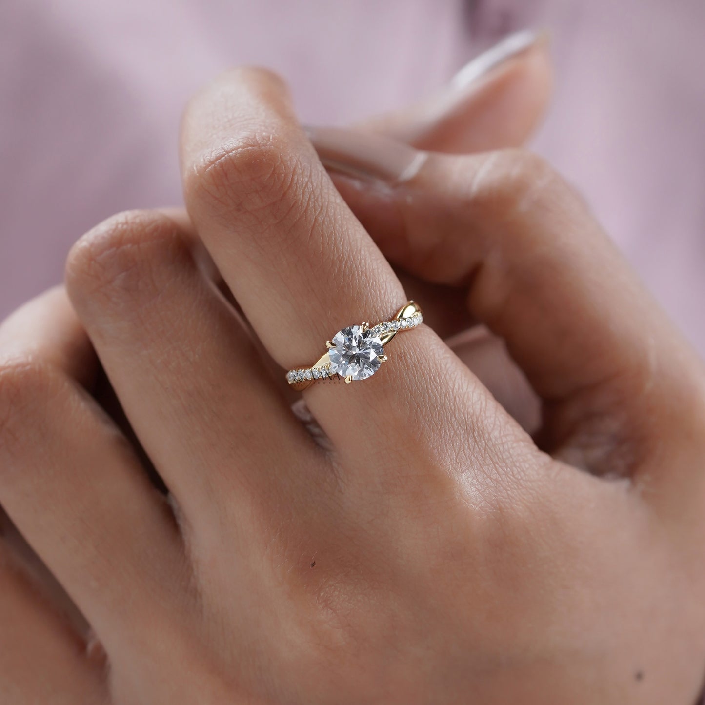 Twisted yellow gold engagement ring
