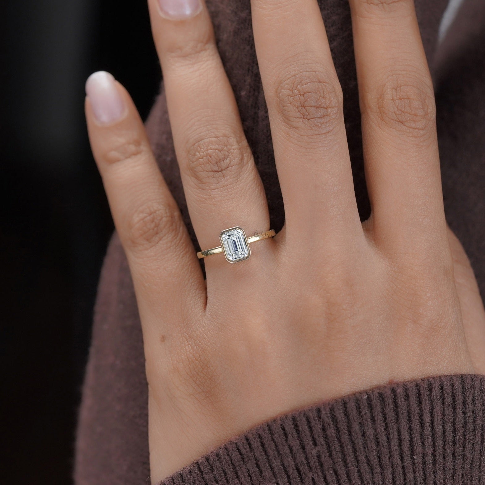 14K gold emerald cut moissanite ring