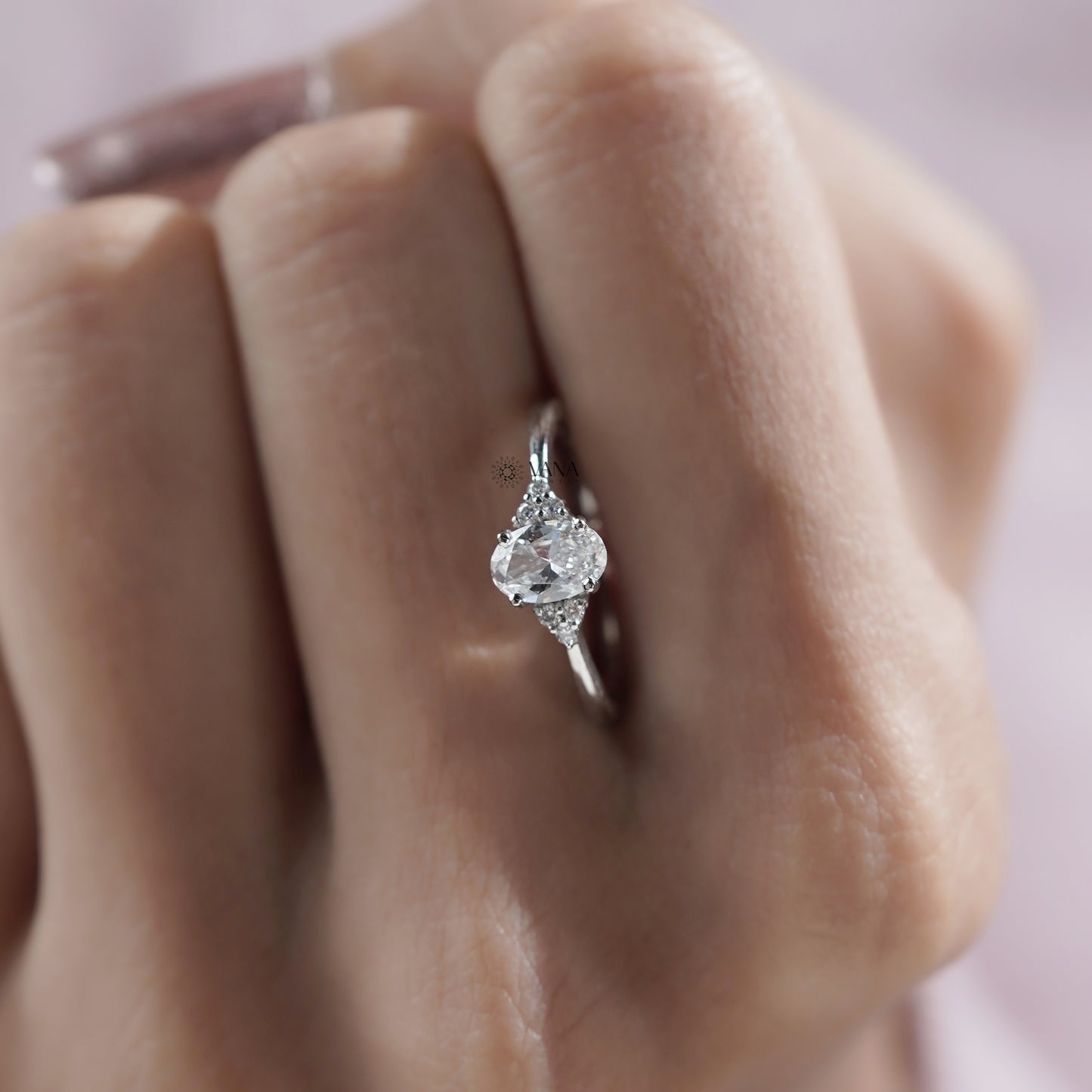 Oval Diamond Seven Stone Engagement Ring with Round Side Diamonds