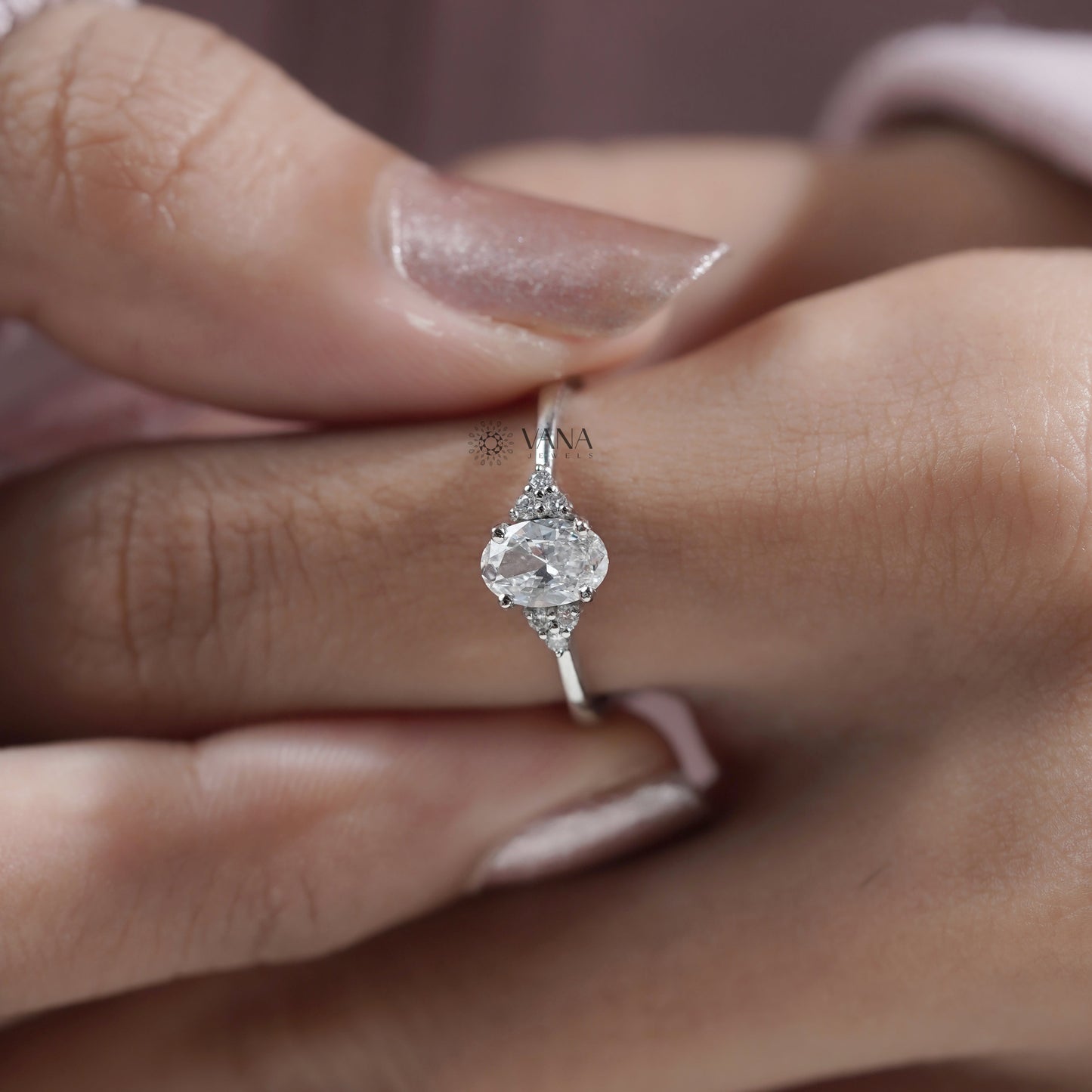 Oval Diamond Seven Stone Engagement Ring with Round Side Diamonds