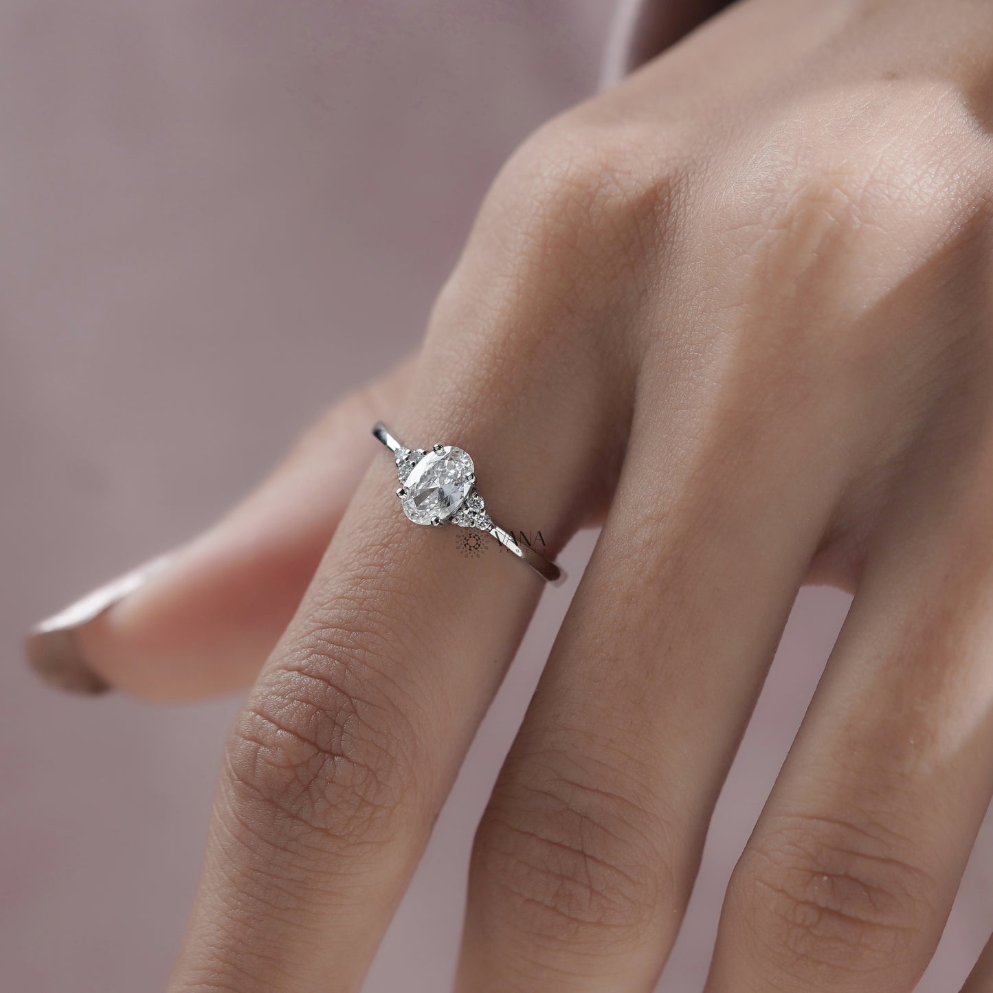 Oval Diamond Seven Stone Engagement Ring with Round Side Diamonds