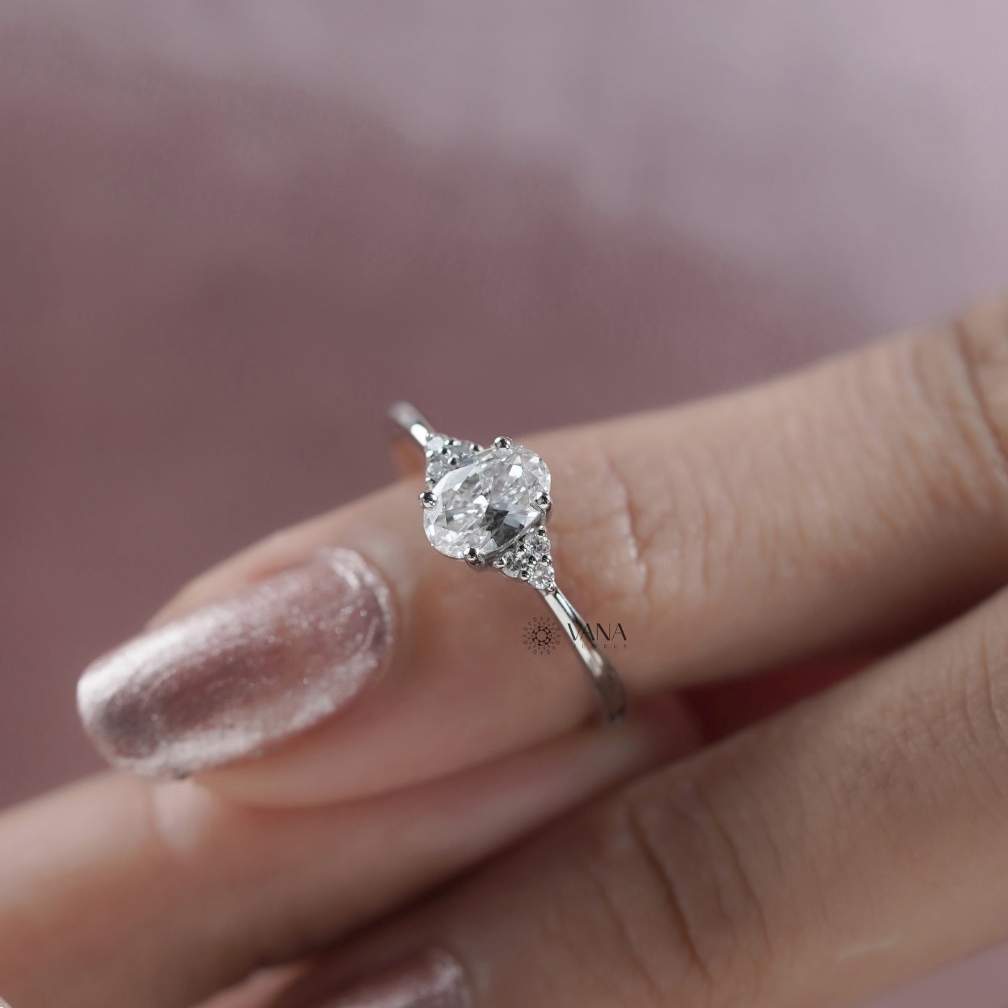 Oval Diamond Seven Stone Engagement Ring with Round Side Diamonds