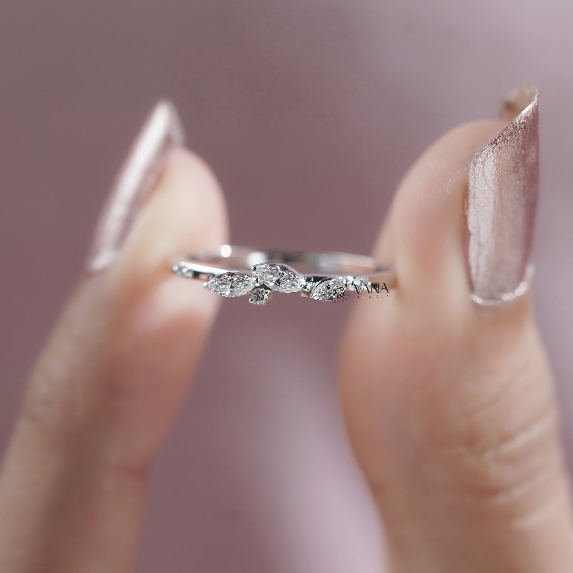 18K white gold wedding band with marquise cut lab grown diamonds in a leaf design